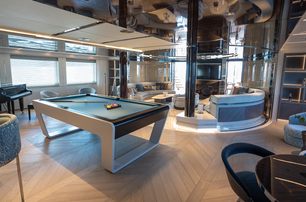 Pool table and seating on superyacht TATIANA