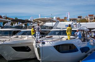 brokers on yacht at boat show in sunshine