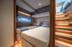 Ferretti 670 motor yacht guest cabin with twin beds 