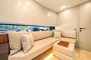 Manari 52 boat interior L-shaped white seating 