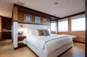 Feadship motor yacht Graycliffs master cabin with large windows 