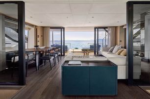 Prestige M8 Evo catamaran saloon lounge and dining area 