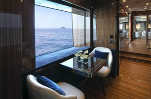 An intimate seating area on board the Overmarine superyacht EL LEON.