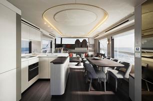 Absolute Navetta 66 motor yacht galley and dining area 
