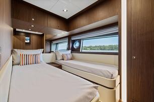 Riva motor yacht Indiscretion guest cabin with twin beds 