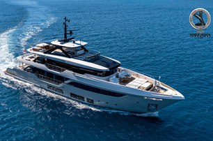 A Custom Line Navetta 38 at sea displaying its commanding exterior spaces