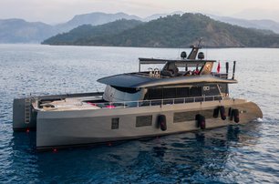 VisionF 80 catamaran at anchor