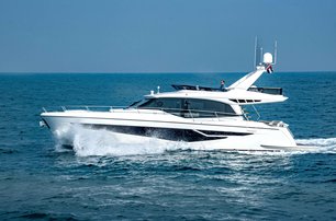 Gulf Craft Majesty 60 running shot port side, bright day, calm sea