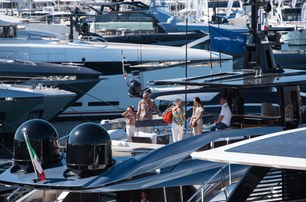 tickets and access to Cannes Yachting Festival mid aerial show over superyachts and people at the show