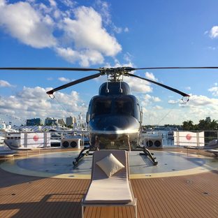 helicopter on superyacht deck helipad