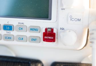 white icom vhf radio set with distress button