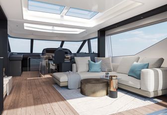 Sunseeker Ocean 156 interior salon wirth white furniture looking forward towards helm station on starboard side