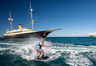 waterski by luxury classic motor charter yacht