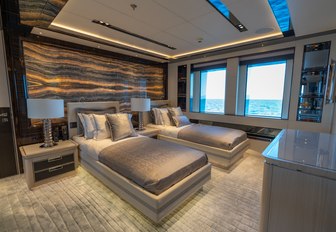 Twin cabin on superyacht TATIANA with view out to see