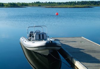 small powerboat on jetty