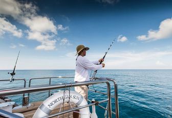 fishing off back of boat