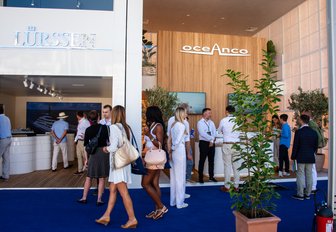 two shipyards side by side stands at boat show