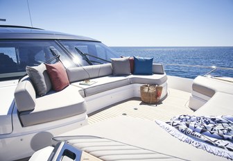 An exterior lounging area on board a Princess V78 superyacht