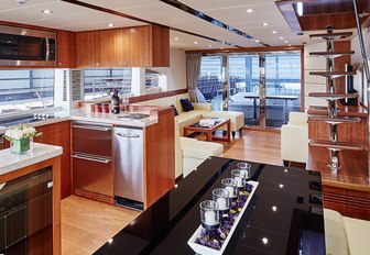 The galley and main saloon on board a Johnson 70 superyacht