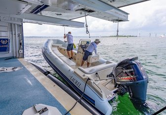 yacht crew tender launching deck crew