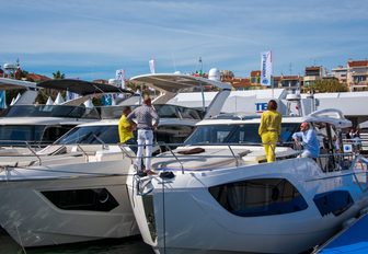 brokers on yacht at boat show in sunshine