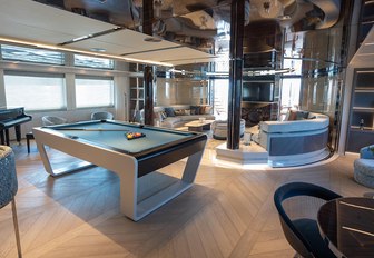 Pool table and seating on superyacht TATIANA