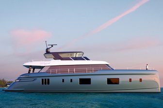 100 Sunreef Power shot from water level towards full starboard profile, bright day with streaks of cloud in sky, calm sea; person in white shirt standing on bow 