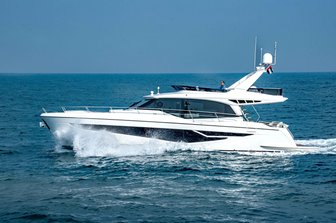 Gulf Craft Majesty 60 running shot port side, bright day, calm sea