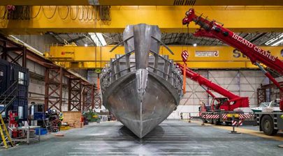 Hull-turn milestone for first Arksen yacht