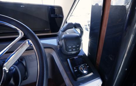 Galeon 520 Fly helm controls with joystick, throttle and steering wheel detail for close-quarters handling