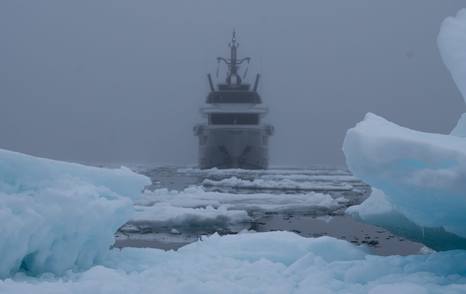 CdM Flexplorer 146 Maverick navigating through dense pack ice in foggy Arctic conditions