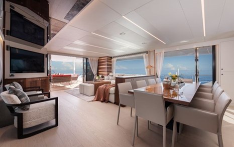 Motor Yacht Genesis' main saloon with dining area