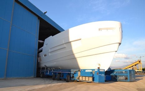 An Arcadia Sherpa XL yacht leaving a shed