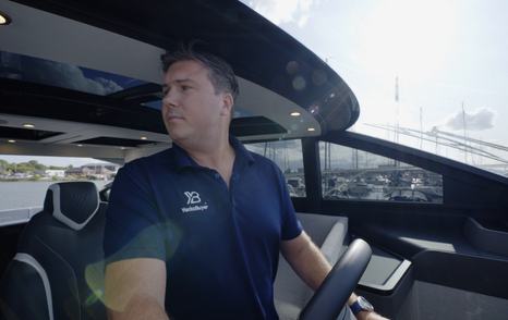 Fairline Targa 58 GTO helm during close-quarters marina manoeuvring