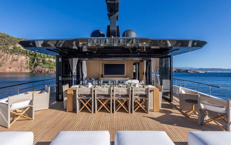 Arcadia A96 motor yacht sundeck with alfresco dining and sunpads