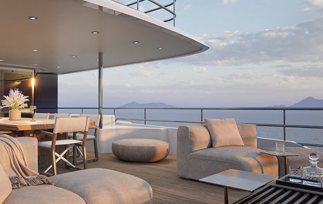 Rendering of Moonen 122 Martinique Hull 8's  aft deck with shaded dining area and seating