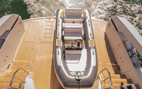 Motor yacht Hard 8's stern with tender 