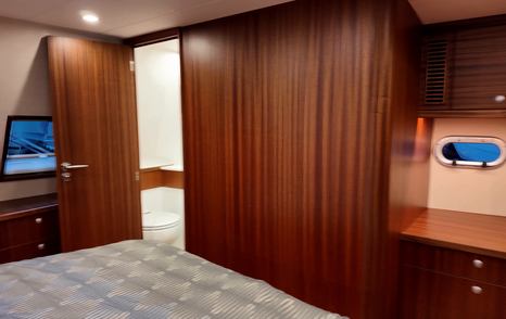 Elling E4 aft owner’s cabin view toward private ensuite bathroom