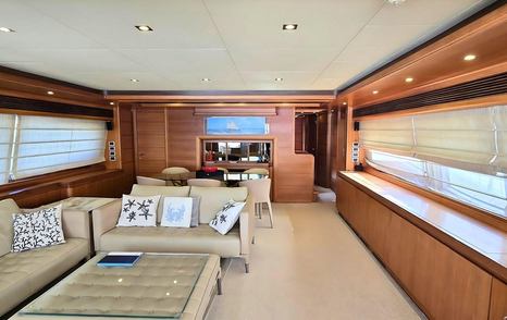 Bleu Blanc main saloon with sofa and dining area