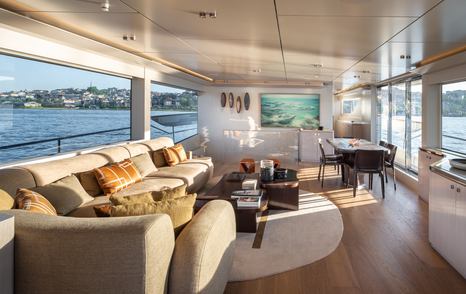 Numarine 27XP Explorer Yacht Maske main saloon with L-shaped sofa and dining table 
