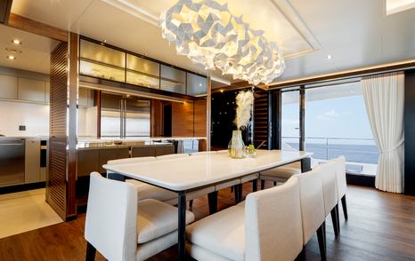 Formal dining area on FD87 with chandelier above table