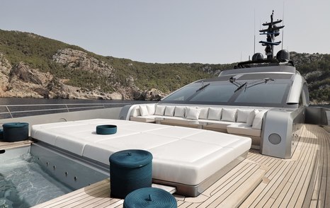 Superyacht No Stress foredeck with white sunpads and jacuzzi