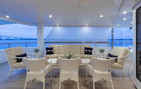 Superyacht Bella Vita's shaded aft seating and lounging area