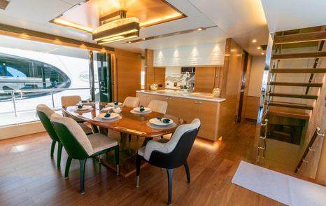 Motor Yacht One More Time saloon dining area