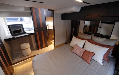 Galeon 520 Fly owner’s cabin bed with integrated lighting and storage