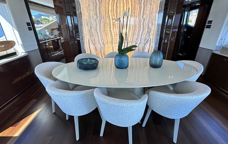 Motor yacht Ghost's main saloon dining area