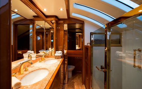 Superyacht Rebecca V's Master cabin en-suite with shower, toilet and twin sinks