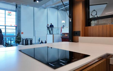 Greenline 42 galley with induction hob and modern cabinetry