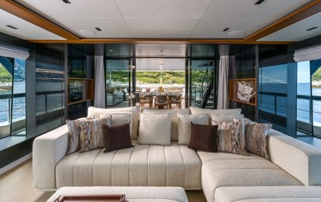 Motor Yacht Sairu upper saloon seating area with L-shaped sofa 