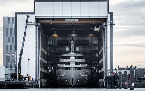 Oceanco's Project Y719 emerging from outfitting shed